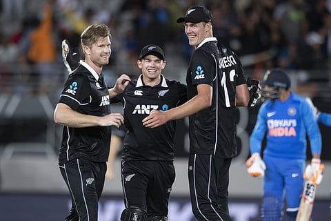 NZ captain Tom Latham (C) celebrate sealing the ODI series against India with James Neesham (L) and Kyle Jamieson. (Photo | AP)