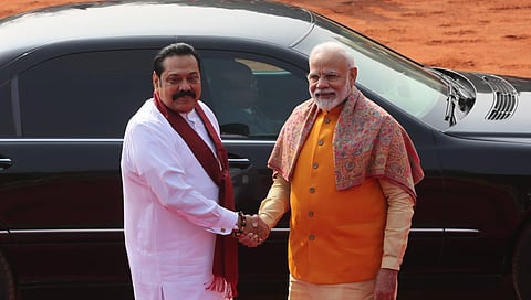 Prime Minister Narendra Modi shakes hands with Sri Lanka's Prime Minister Mahinda Rajapaksa during a ceremonial reception at the Presidential palace in New Delhi on Saturday. (Photo | Shekhar Yadav/EPS)