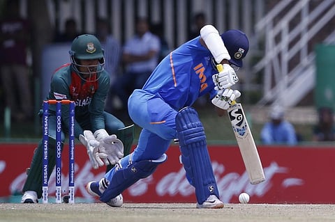 India's Yashasvi Jaiswal (R) plays a shot as Bangladesh's captain Akbar Ali (L) looks on during the ICC Under-19 World Cup cricket finals. (Photo | AFP)