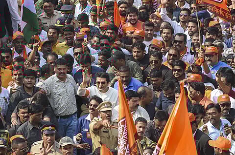 MNS Chief Raj Thackeray along with party workers during a march demanding eviction of illegal immigrants from Pakistan and Bangladesh staying in India. (Photo | PTI)