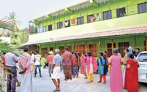People gathered in front of the Puthujeevan Trust Hospital at Thrikkodithanam near Changanassery, demanding action against hospital director V C Joseph | Express