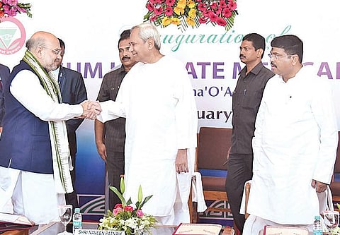 Union Home Minister Amit Shah greeted by Chief Minister Naveen Patnaik during the hospital inauguration. Also seen is Union Steel Minister Dharmendra Pradhan, on Saturday | EXPRESS