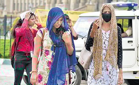 People take all possible measures to beat the summer heat and safeguard themselves from coronavirus in Bengaluru | Nagaraja Gadekal