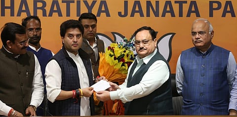 BJP president JP Nadda inducting Jyotiraditya Scindia into the saffron party. (Photo | EPS/Shekhar Yadav)