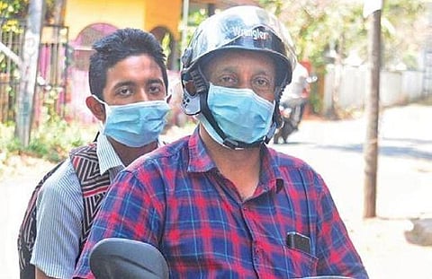 C P Kuriakose returns home after collecting his son who appeared for Plus-One examination, at Aythala in Ranni on Tuesday | A Sanesh