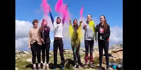 Amgoth Tukaram scaled Mount Kosciuszko on March 10 and played Holi with fellow Australians. (Photo | Amgoth Tukaram Facebook)