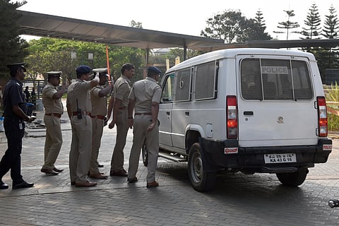 Police deployed at Prestige Golfshire where Madhya Pradesh MLAs are staying Near Devanahalli. (Photo | Nagaraja Gadekal/EPS)