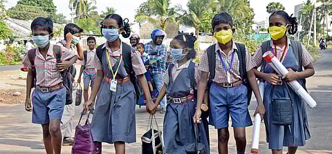 Schoolchildren wear masks in view of coronavirus outbreak. (Photo | G Satyanarayana, EPS)