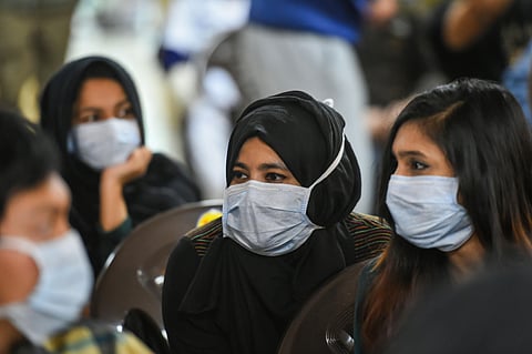 All 112 evacuees including 36 foreign nationals at ITBP facility after they have been tested negative for coronavirus in Chhawla Friday. (Photo | PTI)