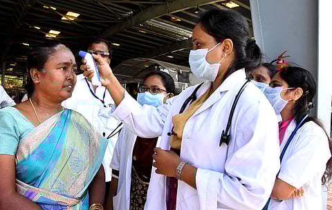TTD health wing screening devotees with thermal scanners to identify the symptoms of COVID-19 at Alipiri check post in Tirupati. (Photo | Madhav K, EPS)