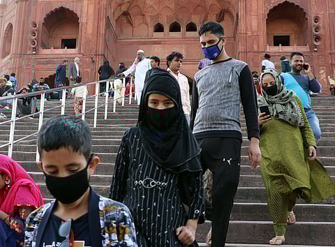 People wear masks as precaution against the coronavirus outbreak at Jama Masjid. (Photo | Ashish Kumar Kataria, EPS)