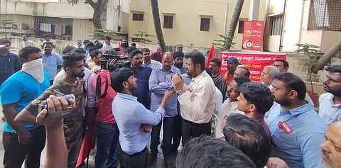 South Western Railway Employees Mazdoor Union protest outside Apollo Hospitals in Malleswaram on Thursday