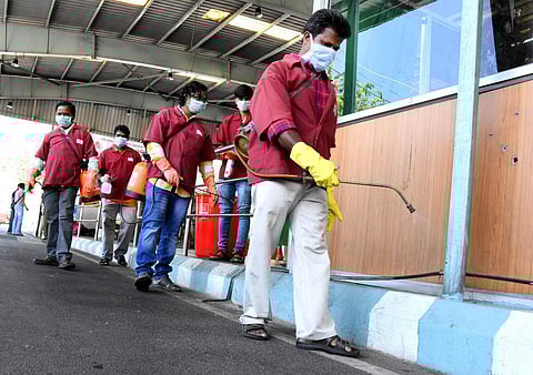 Sanitation workers spraying disinfectants to prevent coronavirus spread. (Photo | EPS, Madhav K)