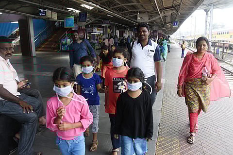 Passengers wearing masks in the view of Coronavirus in Vijayawada railway station. (Photo | EPS/P Ravindra Babu)