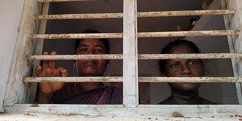 Women 'trapped' in the room look out from the small window in Konnappattu village, Pudukkottai. (Photo | M Muthu Kannan, EPS)