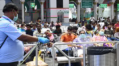 Health team disinfecting the dustbin at Central following COVID-19 threat on Sunday in Chennai. (Photo | P Jawahar/EPS)