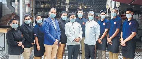 The chefs and staff of all Cafe Delhi Heights outlets are required to wear a mask and wash their hands every hour.