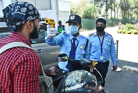 Employees at Interantion tech Park Ascendas in Tharamani been Thermal Checked before entering into the campus after the corona outbreak. (Photo | Ashwin Prasath/EPS)