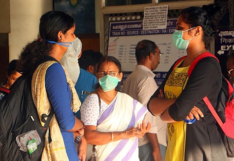 In the wake of coronavirus outbreak, people wear masks while travelling. (Photo| EPS, TP Sooraj)