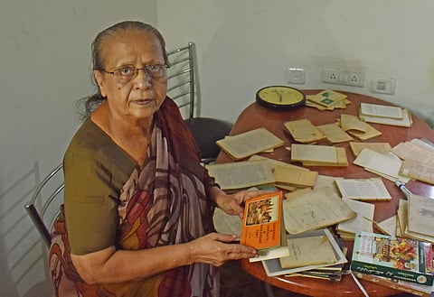 Oudesh Rani Bawa looks through hertiage tomes (Photo | S Senbagapandiyan, EPS)