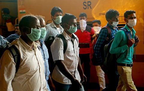 People wear masks at the Kerala station. (Photo| EPS/ TP Sooraj)
