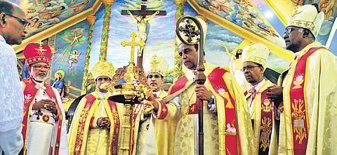 Archbishop Mar Antony Kariyil lighting the lamp during the installation ceremony held at St Mary’s Cathedral Basilica, Ernakulam, on Saturday | Express