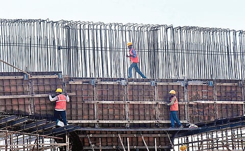 Workers engaged in construction of elevated highway at Kazhakkoottam|FILE PIC