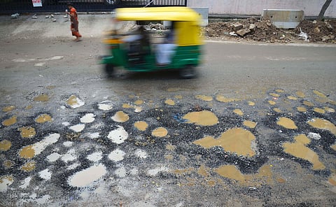 Potholes poses a danger to both motorists and pedestrians alike. (Photo | EPS)