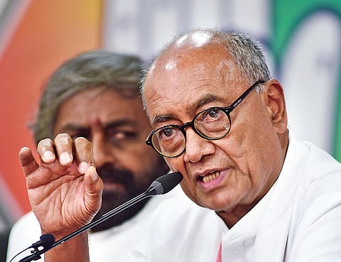 Veteran Congress leader Digvijaya Singh addresses a press conference along KPCC Working President Eshwar Khandre, in Bengaluru on Thursday | Vinod Kumar T