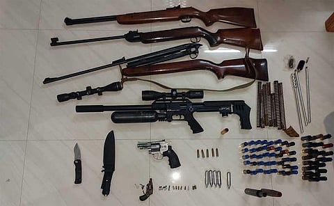 Four arrested for possessing guns