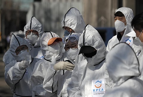 A group of doctors in protective gears. (Photo | AP)