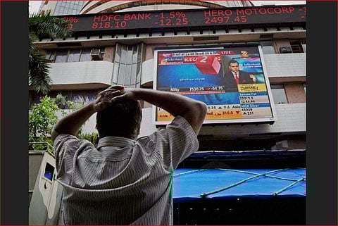 An invester watches the market reactions at BSE in Mumbai. (Photo | PTI)