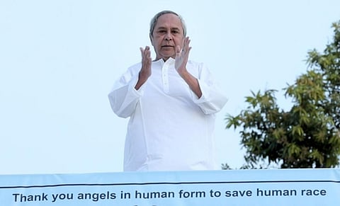 Chief Minister Naveen Patnaik claps to show solidarity with the healthcare workers during Janata Curfew in Bhubaneswar on Sunday. (Photo| EPS)