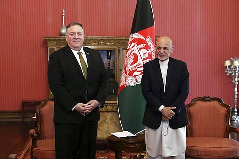 U.S. Secretary of State Mike Pompeo, left, stands with Afghan President Ashraf Ghani, at the Presidential Palace in Kabul, Afghanistan, Monday, March 23, 2020. (Photo | AP)