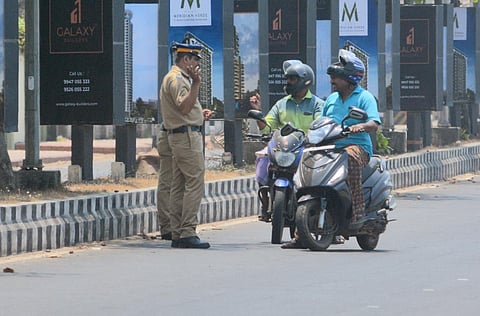 Police advise riders to avoid unnecessary travel in Kerala Kozhikode on Sunday. (Photo | Manu R Mavelil, EPS)