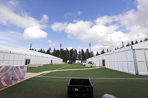 In this photo taken Tuesday, March 24, 2020, two massive temporary buildings meant for use as a field hospital for coronavirus patients stand together on a soccer field in the Seattle suburb of Shoreline, Wash. (Photo | AP)