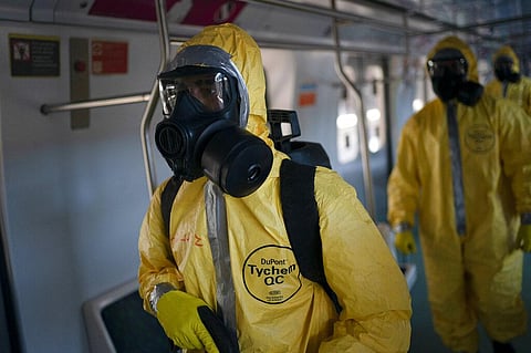 Soldiers disinfect wagons parked at the central train station in Rio de Janeiro, Brazil, where trains connect cities within the state, as a measure to stop the spread the new coronavirus, Thursday, March 26, 2020. (Photo | AP)