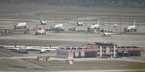 Aeroplanes halt on runways at the airport as all domestic and international flights were cancelled due to the coronavirus lockdown. (File photo| PTI)