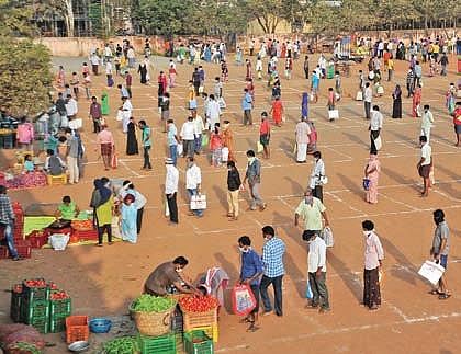 Social distancing being maintained at a Rythu Bazaar in Vijayawada on Thursday.| Prasant Madugula