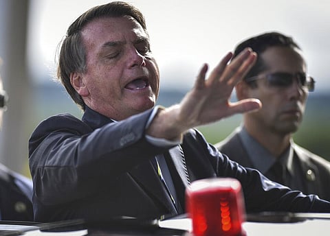 Even as coronavirus cases mount in Latin America’s largest nation, Bolsonaro is calling the pandemic a momentary, minor problem and saying strong measures to contain it are unnecessary. (Photo | AP)