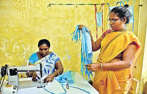 Workers at a resource recovery centre of Chennai Corporation in Alandur making face masks in view of the rising demand (Photo | R Satish Babu)