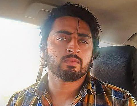 Mohammed Shahrukh who waved a gun at Delhi Police personnel in the Jaffrabad-Maujpur area during clashes between a group of anti-CAA protestors and supporters of the new citizenship act on Feb. 24 in New Delhi Tuesday March 3 2020. (Photo | PTI)