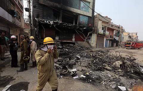 Burnt-out and damaged shops following clashes between people supporting and opposing a contentious amendment to citizenship law in New Delhi on Wednesday. (Photo | Shekhar Yadav, EPS)