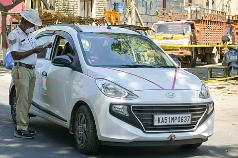 The traffic police have been strictly monitoring the movement of citizens and checking for valid permit.  (Photo | EPS/Meghana Sastry)