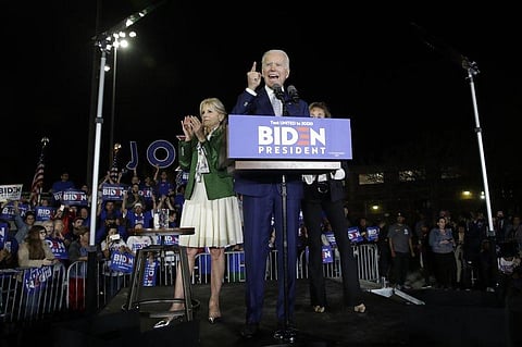 Democratic presidential candidate former Vice President Joe Biden speaks, next to his wife Jill during a primary election night rally on Tuesday (Photo | AP)