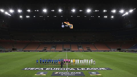 Inter Milan, left, and Ludogorets line-up inside the empty San Siro stadium in Milan, Italy on Feb. 27, 2020. (File Photo | AP)