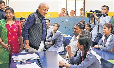Deputy Chief Minister Manish Sisodia interacts with students at GBSS School, in Delhi. (Photo | EPS/Ashish Kumar Kataria)
