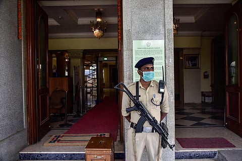A security staff wearing surgical mask as precautionary measure against COVID-19 at Salarjung Meuseum in Hyderabad. (Photo | Vinay Madapu, EPS)