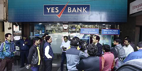 Customers gather inside the YES bank branch at Janpath in New Delhi. (Photo| Parveen Negi, EPS)