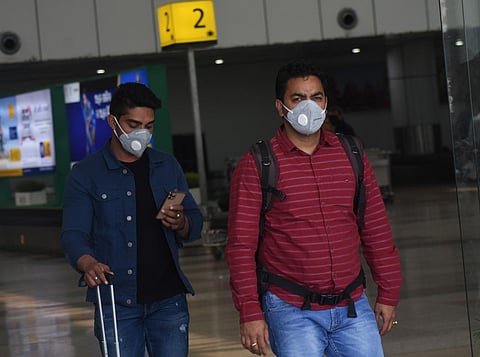 Passengers wearing face mask to guard against coronavirus. (Photo| EPS/ Biswanath Swain)